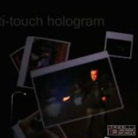 图片是多点触摸互动全息技术（Multitouch Hologram）的演示