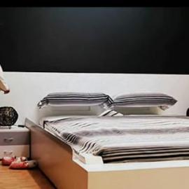 自动铺平被子的床