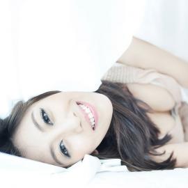 绽放灿烂笑容的常一娇