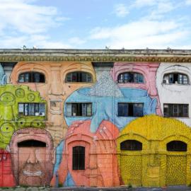 Blu 在罗马原军用仓库外墙描绘个性面孔壁画