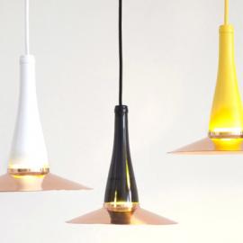 utcreatives 工作室将玻璃瓶手工升级改造成laflor灯