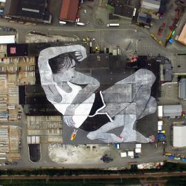ella & pitr paint the largest mural in the world for nuart festival in norway